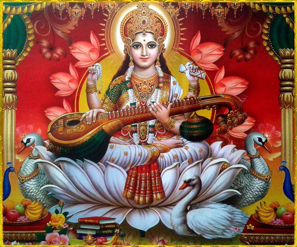 saraswati-devi-sits-red-kwhp6yzv656blgi7
